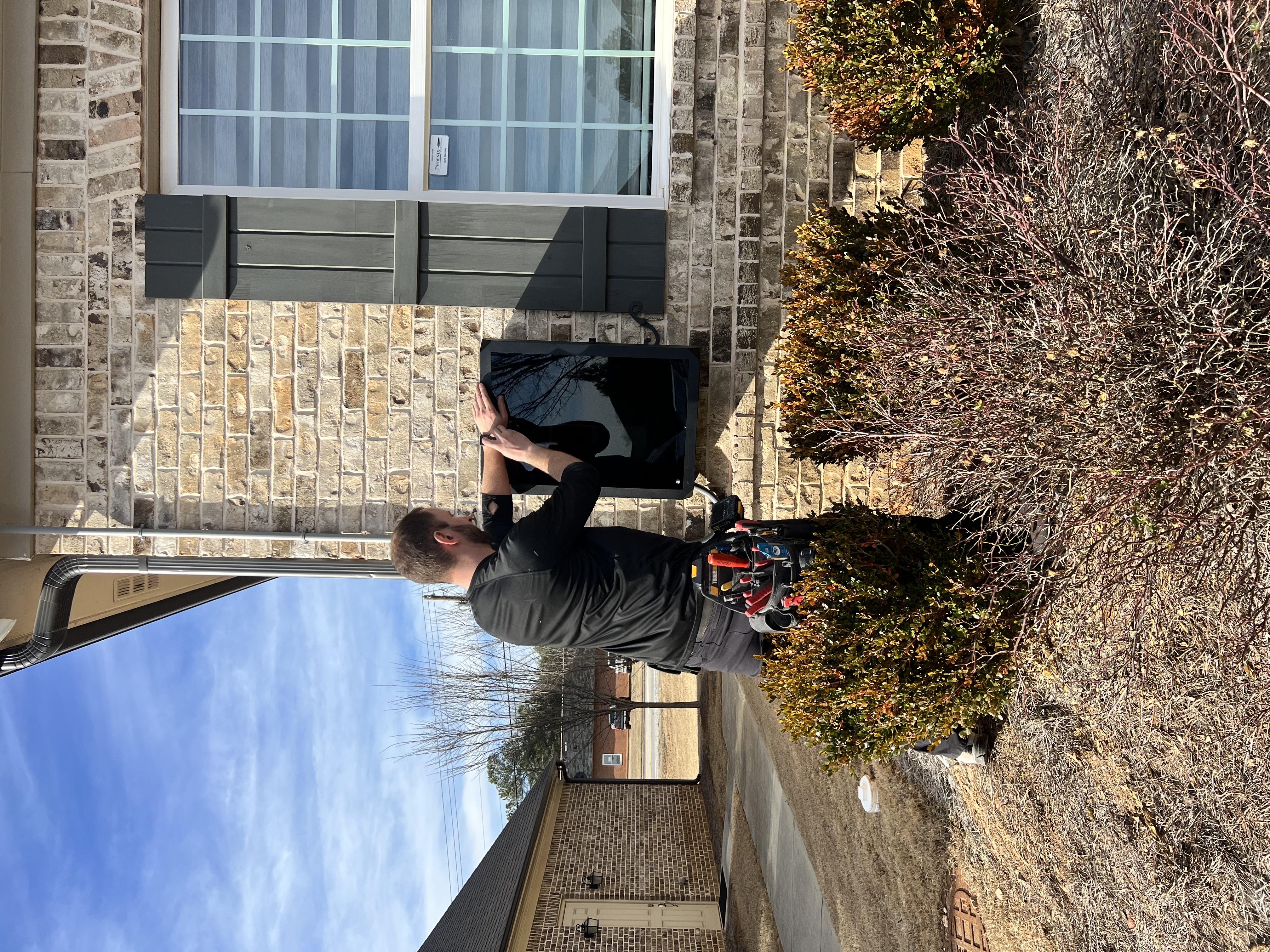 EV charger installation in progress by licensed electrician near Kennesaw GA